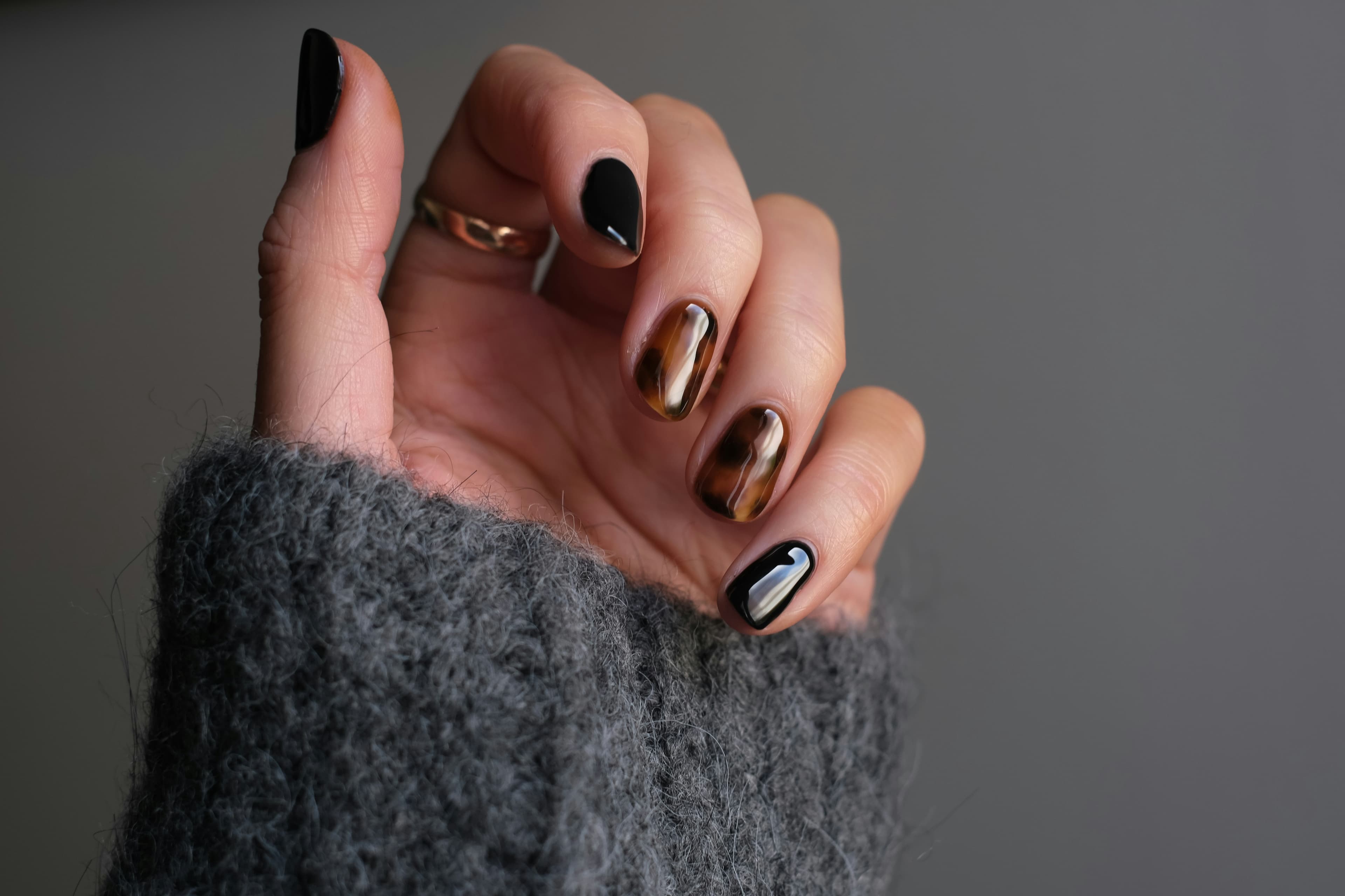 Statement manicure with silver ring detail